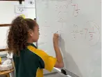 Student at whiteboard